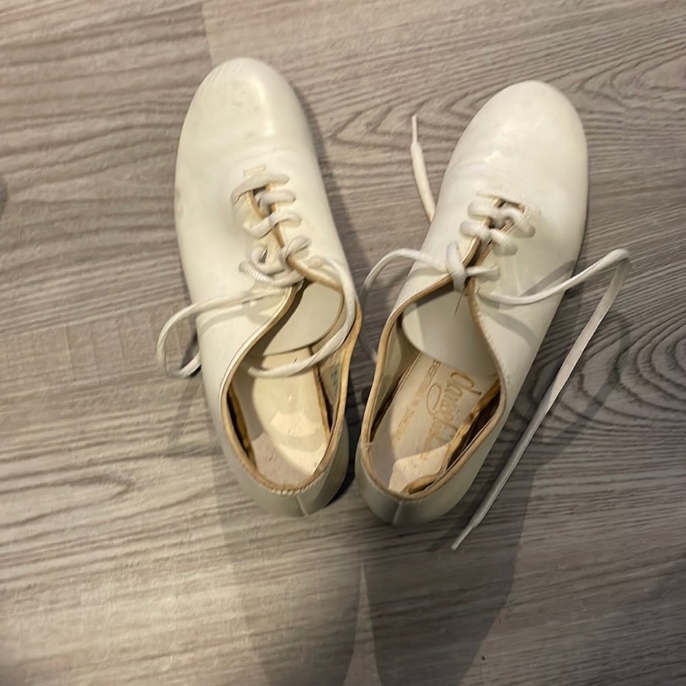 White tap shoes, size 7, worn but still in wiring condition